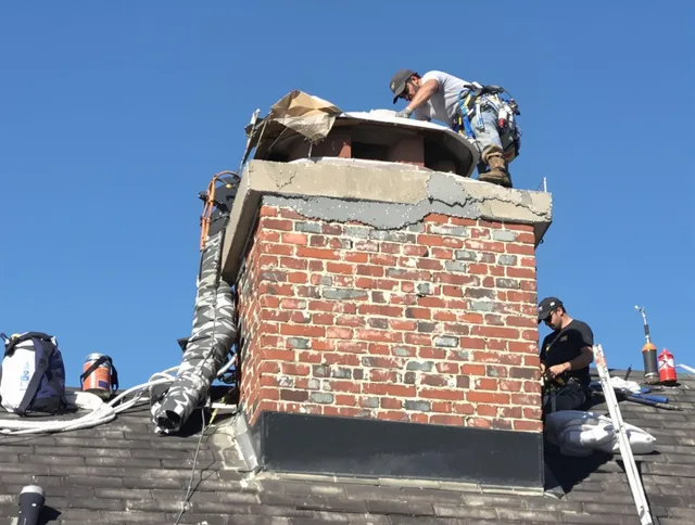 Hawthorne Chimney Sweep installing a custom chimney crown in Hawthorne, CA