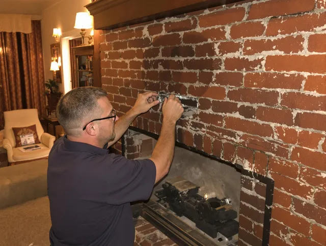 Hawthorne Chimney Sweep expert fixing a fireplace in Hawthorne, CA
